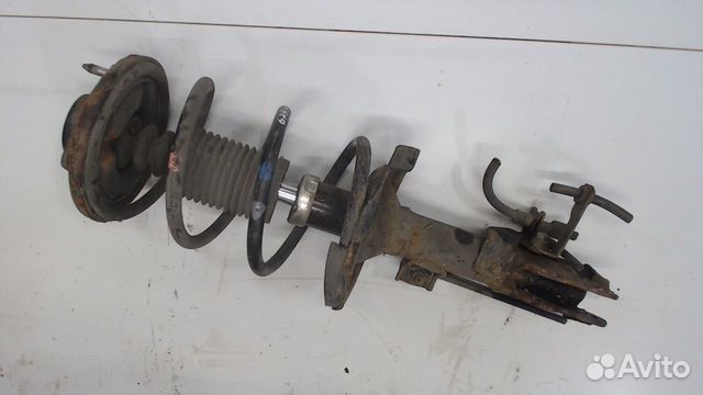 Амортизатор подвески передний Mitsubishi Lancer 10