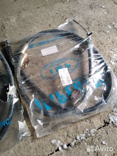 Трос стояночного тормоза almera n15