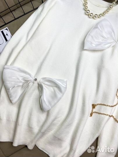 Свитер с бантами