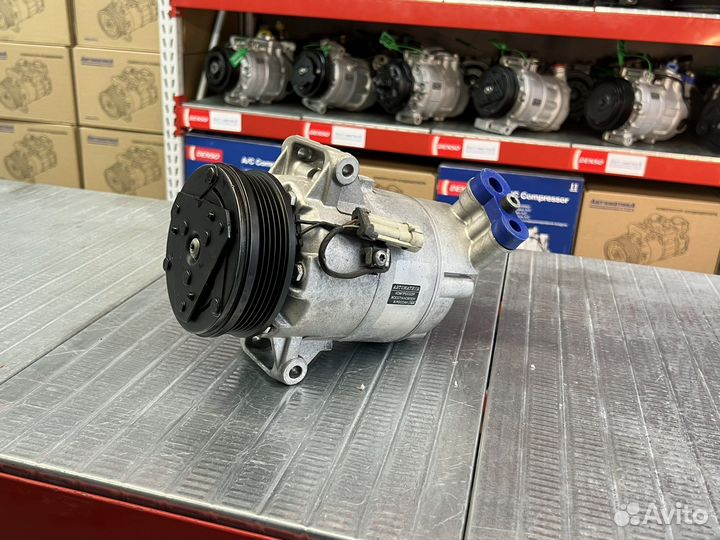 Компрессор кондиционера Opel Astra j