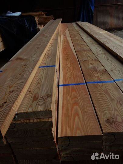 Строительство с досками лиственницы