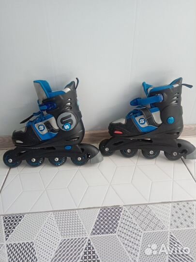 Роликовые раздвижные коньки