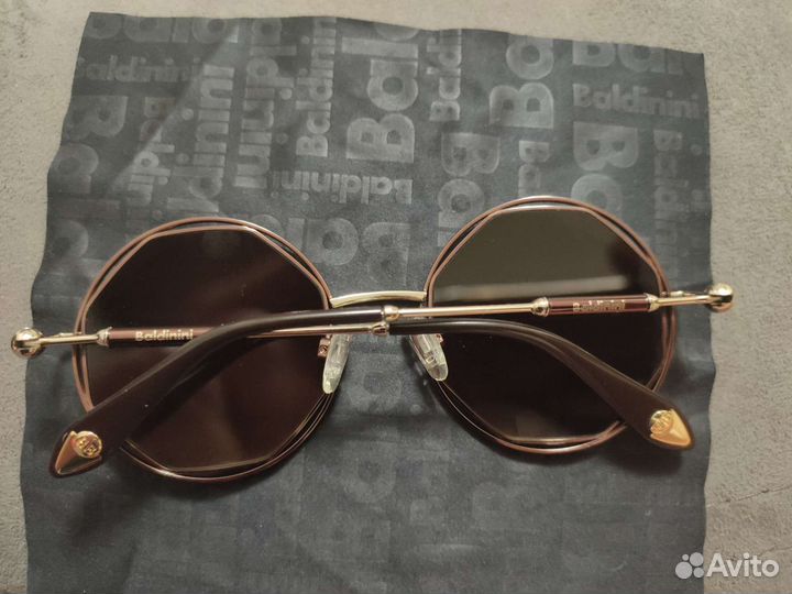 Солнечные очки женские