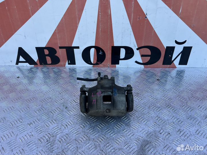 Суппорт передний правый Mitsubishi Lancer 10