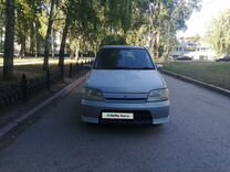 Nissan Cube 1.3 AT, 2000, 235 555 км, с пробегом, цена 210 000 руб.