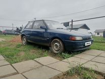 Mazda Familia 1.6 AT, 1993, 220 000 км, с пробегом, цена 210 000 руб.