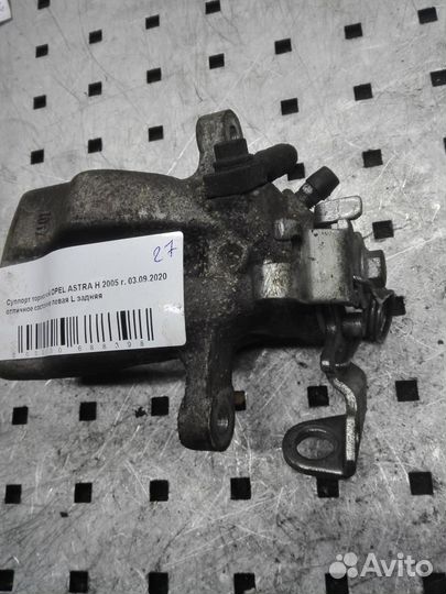 Суппорт задний левый Opel Astra H/Astra Family H