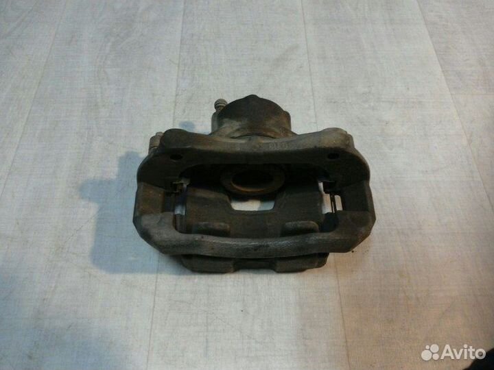 Суппорт тормозной передний левый Chevrolet Cruze
