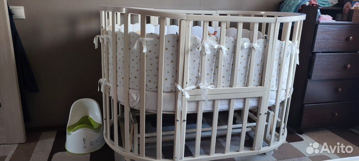 Детская кроватка с поперечным маятником