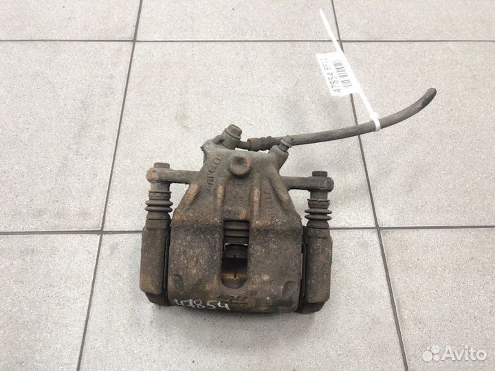 Суппорт тормозной передний левый Nissan Note