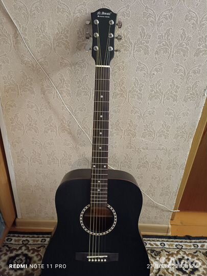 Акустическая гитара