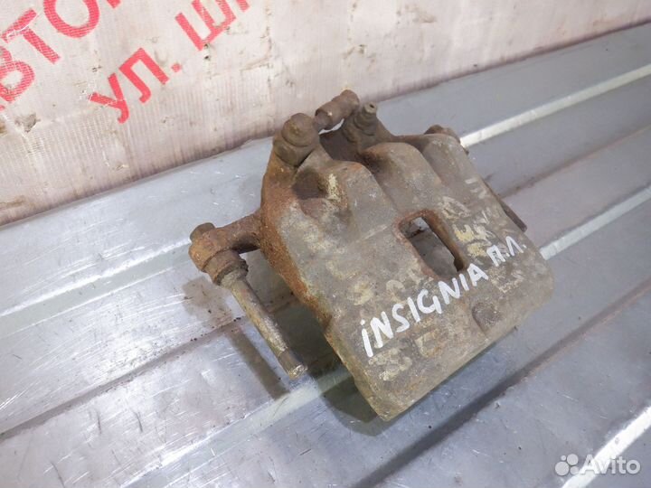 Суппорт тормозной передний левый Опель Инсигния
