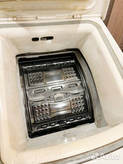 Стиральная машина с вертикальной загрузкой Brandt