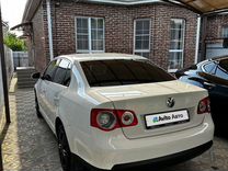 Volkswagen Jetta 1.6 AMT, 2010, 245 000 км, с пробегом, цена 655 000 руб.