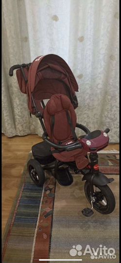Трехколесный велосипед с ручкой