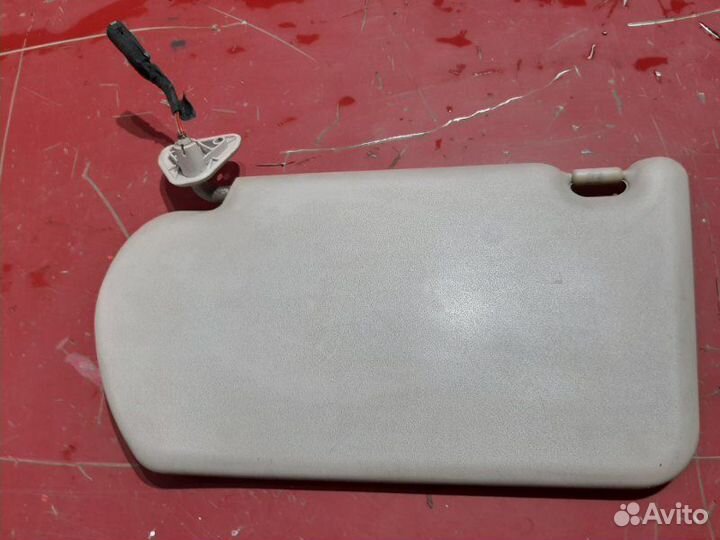 Козырек солнцезащитный правый Nissan Almera N16