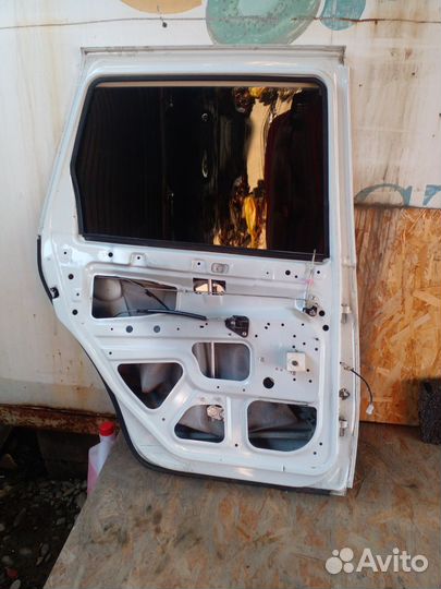 Дверь задняя левая Калина универсал