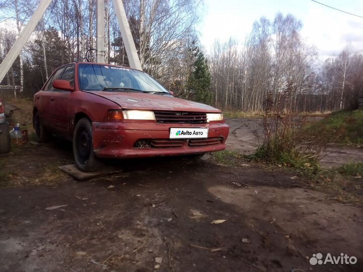 Mazda Familia 1.5 AT, 1991, 175 000 км