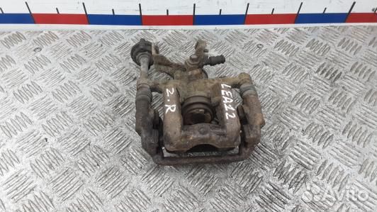 Суппорт тормозной задний правый opel astra J (LEA1