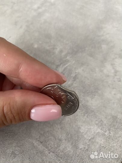 Монета номиналом 2 (брак с двойным выкусом)