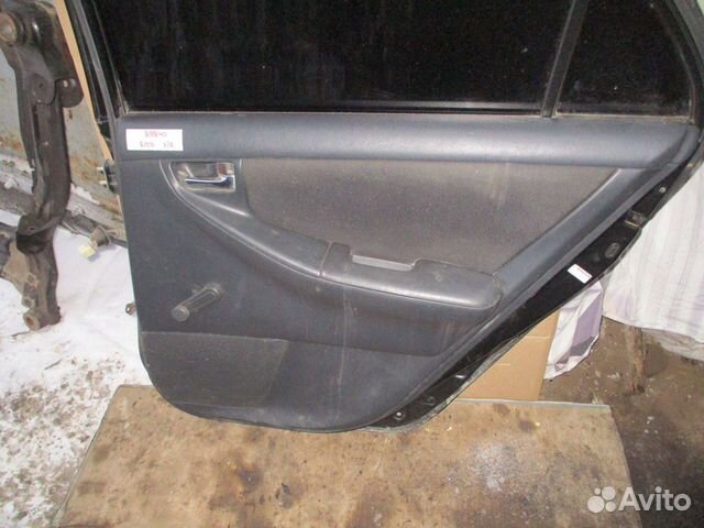 Обшивка двери задней правой Toyota Corolla (E120)