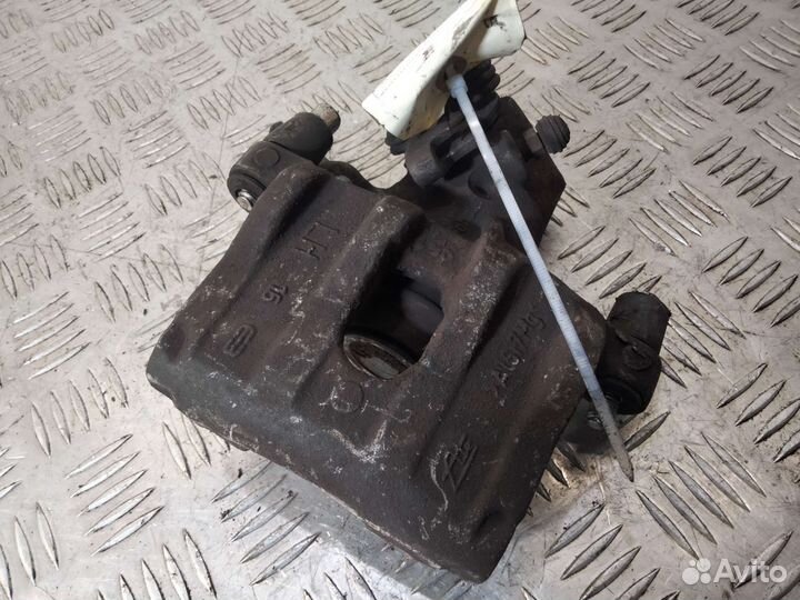 Суппорт задний левый Форд Фокус 2