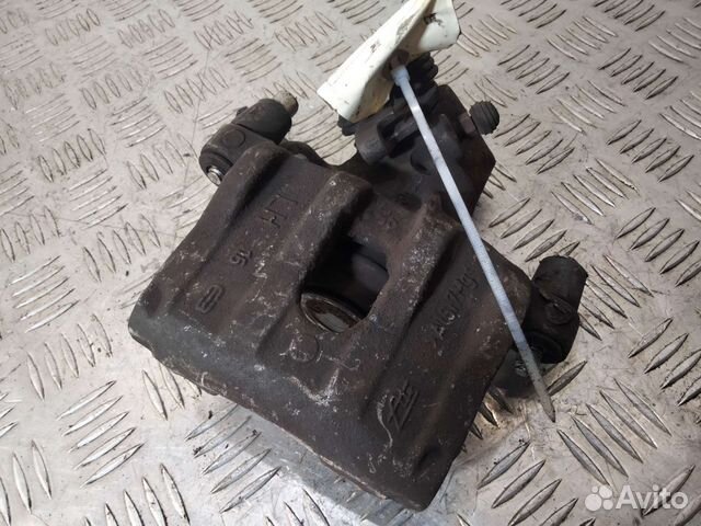 Суппорт задний левый Форд Фокус 2