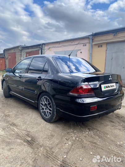 Mitsubishi Lancer 1.6 AT, 2009, 320 000 км