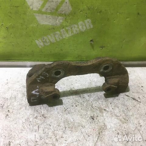 Скоба суппорта переднего Мазда Мазда 3 бк