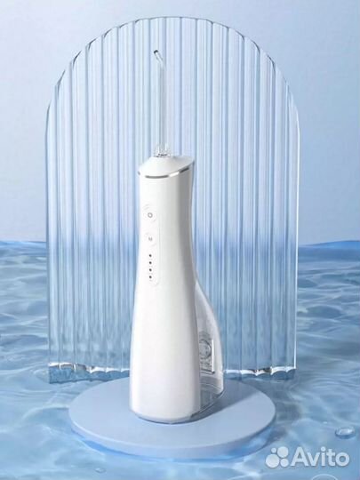 Ирригатор портативный новый+подарок 2 шт з/щ