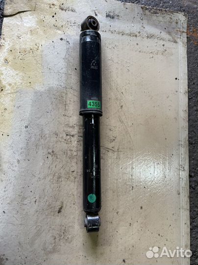 Опель антара задний амортизатор