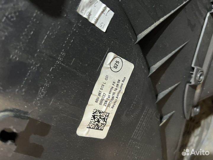 Обшивка двери передней левой skoda rapid