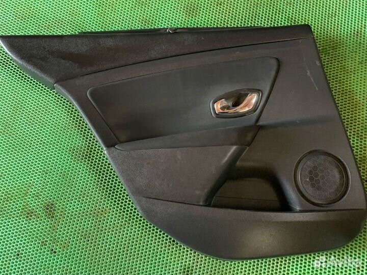 Обшивка карта двери задняя левая Renault Fluence