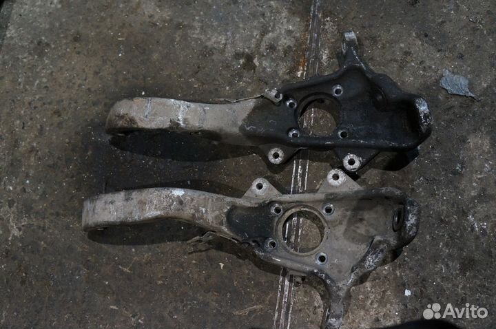 BMW Е70 Х5 Кулак поворотный передний