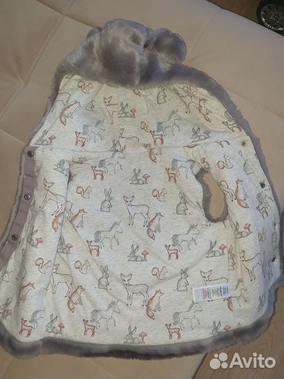 Меховая жилетка с капюшоном