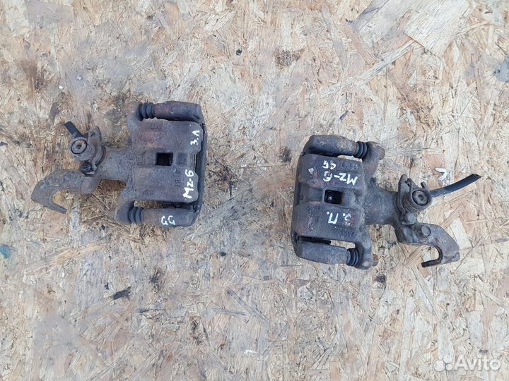 Суппорт тормозной задний правый Мазда 6 GG