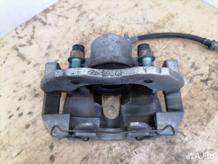 Передний тормозной суппорт Мазда 3 BK BL