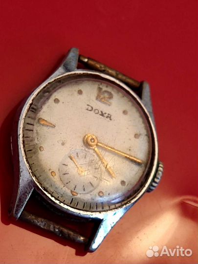 Часы doxa