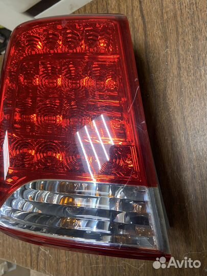 Фонарь левый наружный LED Kia Sorento 2 дорест
