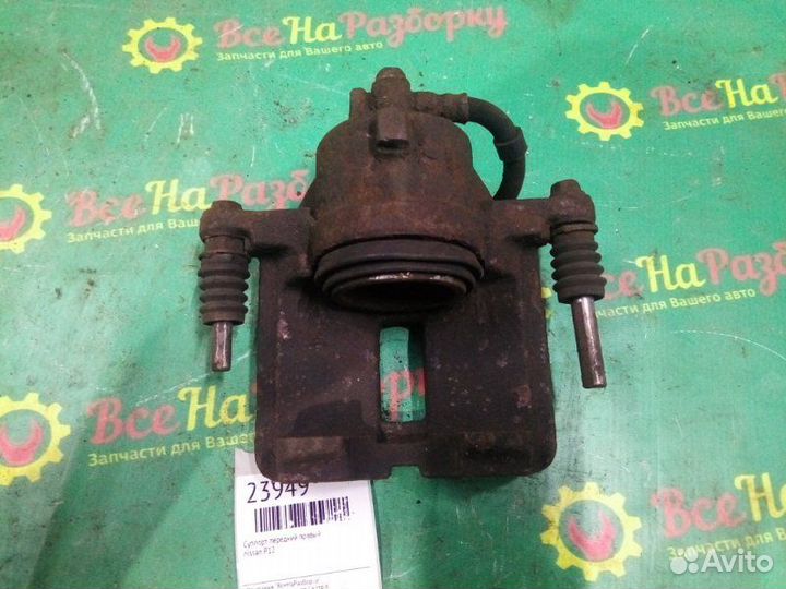 Суппорт передний правый Nissan P12