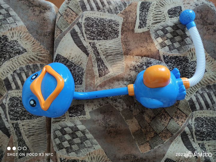 Механический душ-игрушка