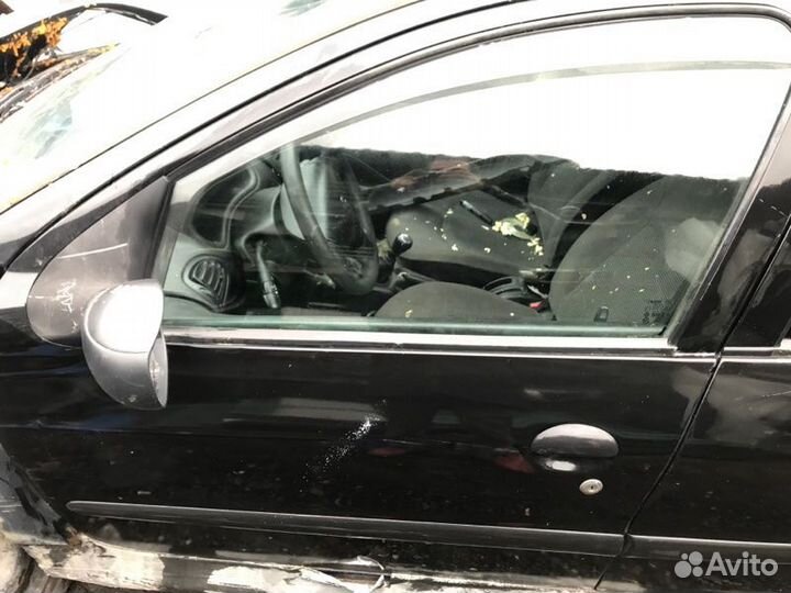 Дверь водительская передняя левая Peugeot 206