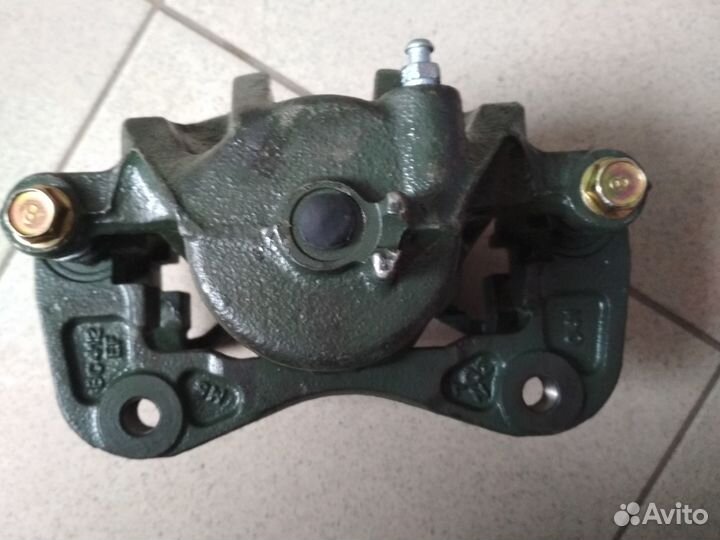 Суппорт передний правый Киа рио и Солярис