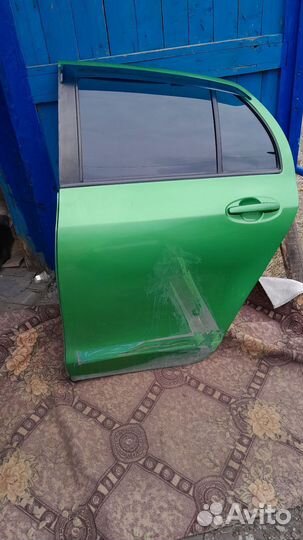 Дверь задняя левая Тойота vitz