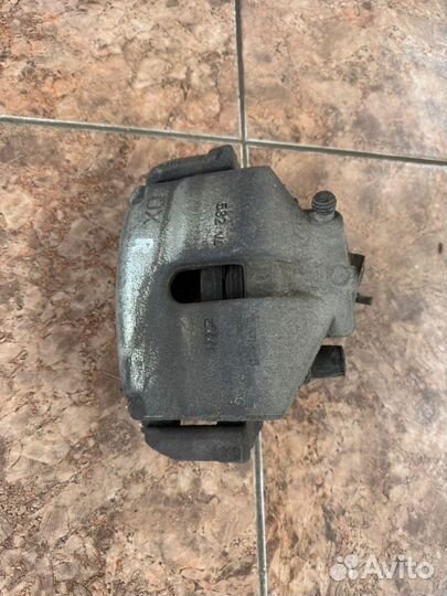 Суппорт тормозной перед правый Volkswagen Polo 5