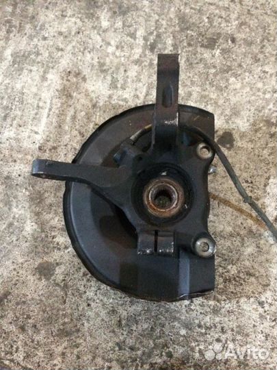 Кулак поворотный левый Мицубиси Аутлендер CU