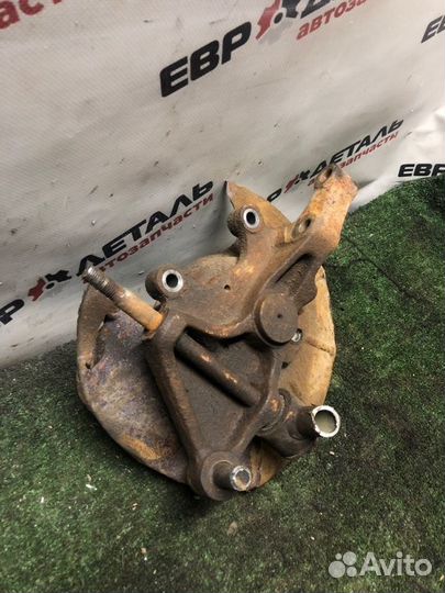 Кулак поворотный задний левый Kia Spectra седан