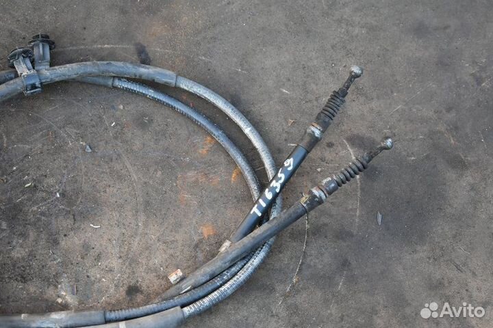 Тросс ручника Opel Zafira B A16XER 2005 - 2014