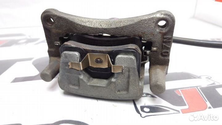 Суппорт тормозной задний Mitsubishi Outlander II