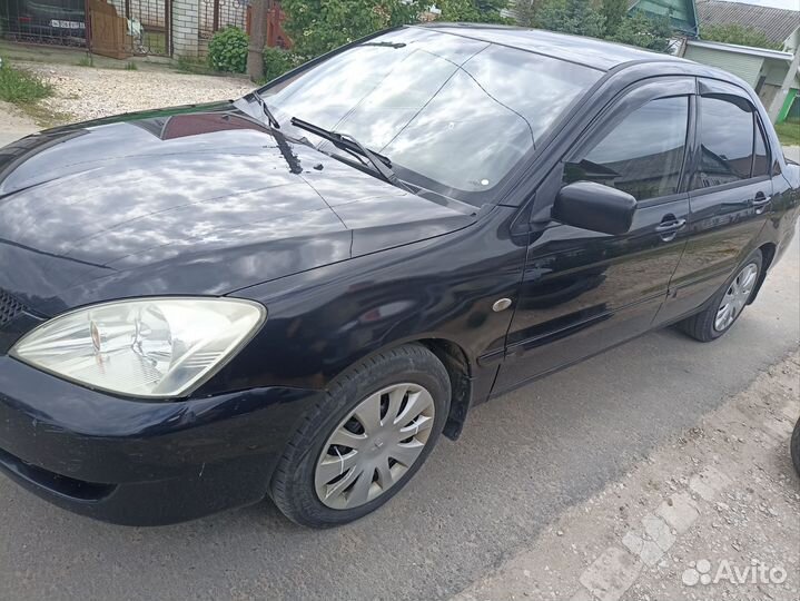 Mitsubishi Lancer 1.6 МТ, 2006, 213 000 км